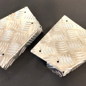 Juego de protectores de esquina traseros en aluminio damero